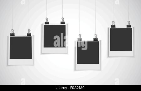 Blank photo frame appeso su una linea Illustrazione Vettoriale