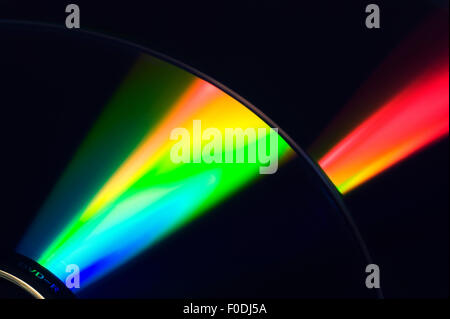 Il raggio laser sul background del DVD Foto Stock