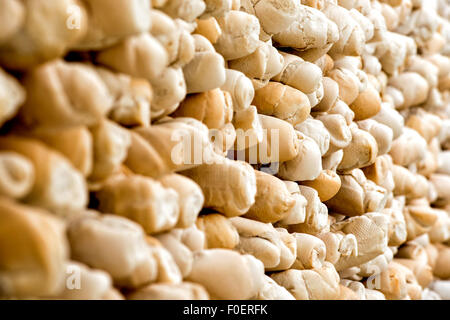 Texture di sfondo di una pila di pane appena sfornato il pane bianco rotoli Foto Stock