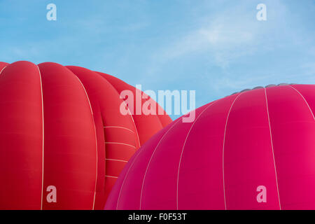 Colorate luminosamente gonfiare palloncini presso il trentasettesimo "Bristol Balloon Fiesta, Foto Stock