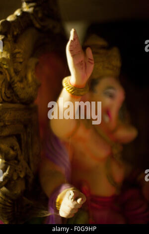 Idoli degli dei Indiani, Ganesha, Buddha e l'icona Air India Sardar Foto Stock