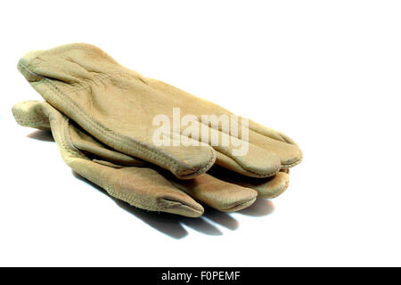 Coppia di lavoro guanti di cuoio isolato su bianco Foto Stock