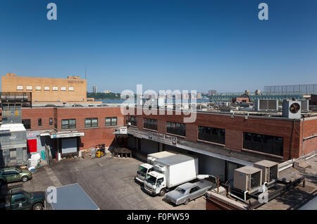 Stati Uniti d'America, nello Stato di New York, New York City, Manhattan, confezionamento carne cantiere in Chalsea visto dalla linea alta parco pubblico. Foto Stock