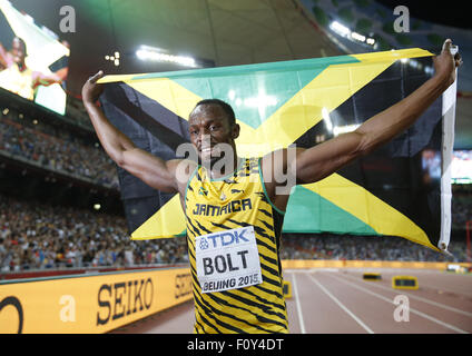 Pechino, Cina. 23 Ago, 2015. La Giamaica Usain Bolt festeggia dopo aver vinto gli uomini 100m Finale al 2015 IAAF Campionati del Mondo a Pechino Capitale della Cina, su agosto 23, 2015. Credito: Xinhua/Alamy Live News Foto Stock