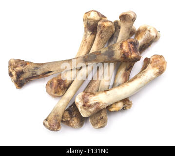 Pila di le ossa del pollo isolato su bianco Foto Stock