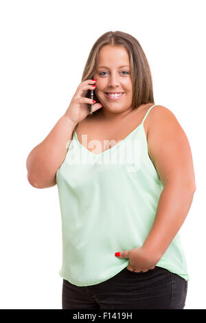 Splendida e grande donna al telefono, isolato su bianco Foto Stock