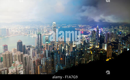 Hong Kong da giorno a notte Foto Stock