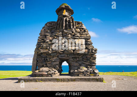 La scultura Bárður, metà troll, figura leggendaria, Kjartansson, Arnarstapi, Snaefellsjökull National Park, Islanda Foto Stock