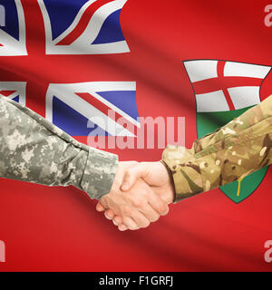 Soldati e handshake provincia canadese bandiera - Ontario Foto Stock