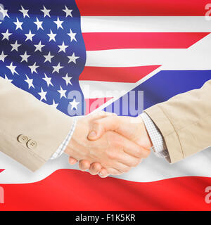 Imprenditori stringono le mani - Stati Uniti e della Tailandia Foto Stock