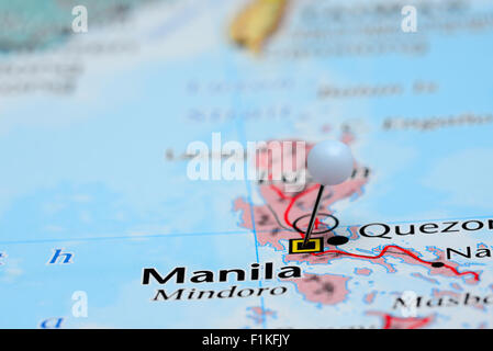 Manila imperniata su una mappa di Asia Foto Stock