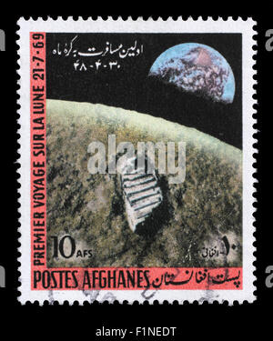 Timbro stampato in Afghanistan mostra il primo atterraggio sulla luna - 1969, circa 1970. Foto Stock