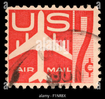 Stati Uniti francobollo del valore di 7c utilizzato per aria d'oltremare le consegne di posta che mostra la posta di aria simboli Foto Stock
