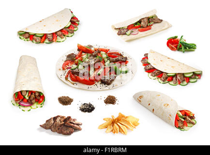 Impostare isolate di carni bovine shawarma (noto anche come Döner Kebab, gyros pita o tortilla) con i suoi ingredienti Foto Stock