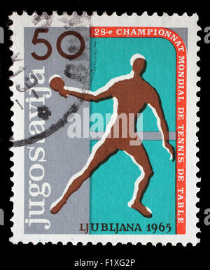 Timbro stampato dalla Jugoslavia mostra 28 tavola World Tennis Championship in Lubiana, circa 1965. Foto Stock