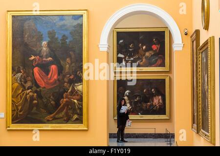 L'Italia, Lombardia, Milano, Palazzo barocco Brera la Pinacoteca di Brera e il museo di arte antica e moderna inaugurato nel 1809 da Ludovico Carracci tabella Predica di Sant'Antonio Abate agli Eremiti (1615) e nella parte inferiore due tele di Mattia Preti ( XVII sec. Foto Stock