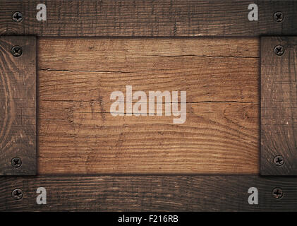 Marrone telaio in legno avvitato sul pannello di legno Foto Stock
