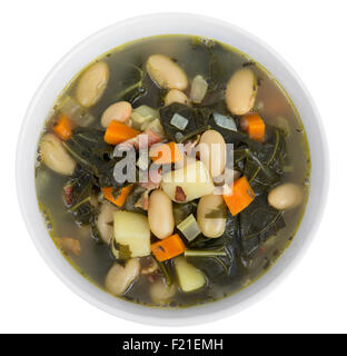 Fagiolo Bianco bacon e kale sano Soup Bowl closeup su bianco Foto Stock