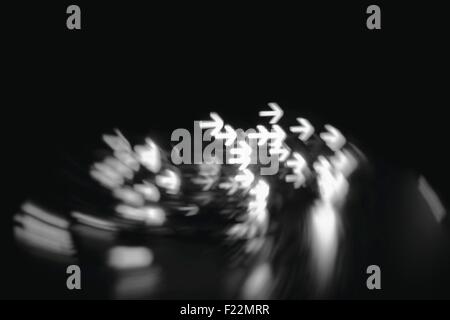 Molte le frecce indicano la direzione abstract blur sullo sfondo Foto Stock