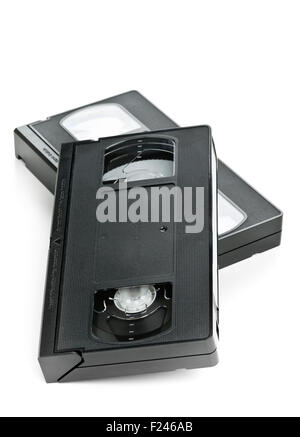 Due video analogico home system (VHS) nastro su sfondo bianco Foto Stock