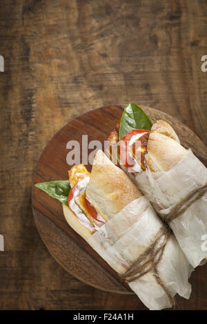 Baguette panini al formaggio e pomodoro Foto Stock