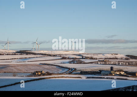 West Kilbride colline e mulini a vento nella neve Foto Stock