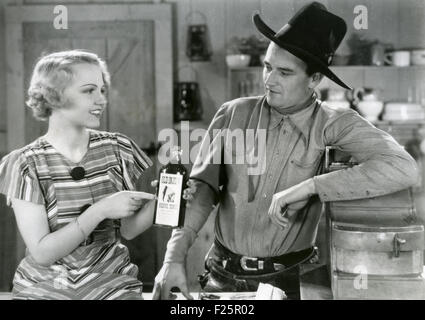 JOHN WAYNE (1907-1979) Noi attore di film in film non identificato circa 1932 Foto Stock