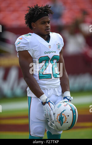 SEP 13, 2015 : Delfini di Miami cornerback Bobby McCain (28) si riscalda prima dell'apertura di stagione match tra i delfini di Miami e Washington Redskins a FedEx in campo Landover, MD. I Delfini sconfitti alle pellerosse 17-10 Foto Stock