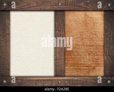 Marrone a telai di legno avvitata su graffiato pannello di legno e di carta leggera Foto Stock