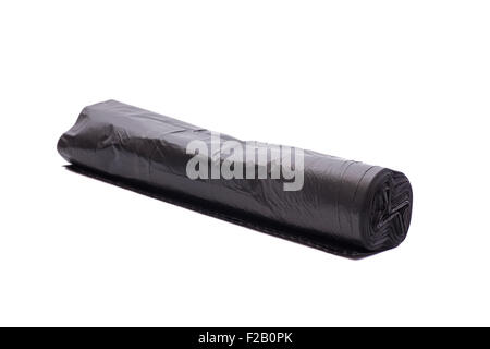 Rotoli di monouso sacchetti cestino isolato su sfondo bianco Foto Stock