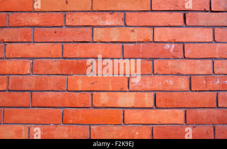 Sfondo di rosso la parete in mattoni Foto Stock