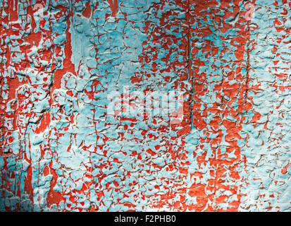 Weathered Shabby tavole di legno con crepe sulla vernice di colore sfondo Foto Stock