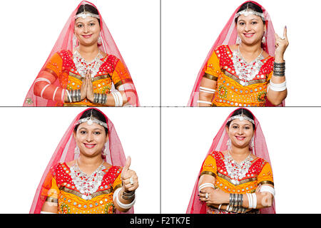 1 indiano abitante di Rajasthani donna adulta confronto multi-tasking Foto Stock