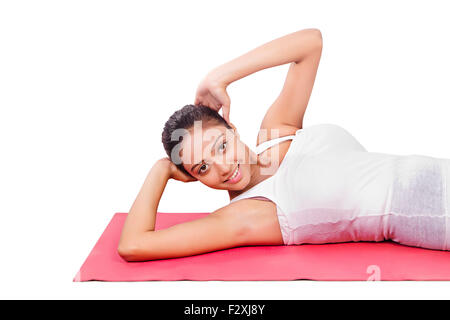 1 indian donna adulta sit ups Stretching Foto Stock
