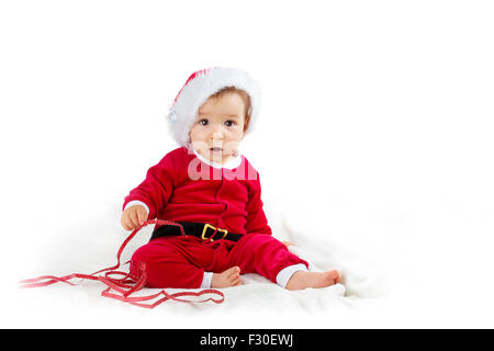 Baby isolati su sfondo bianco in santa costume Foto Stock