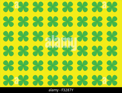 Quattro foglie verde trifoglio predisposte su sfondo giallo Foto Stock