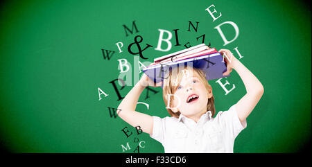 Immagine composita della pupilla carino con libri Foto Stock