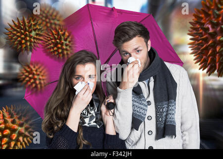 Immagine composita della giovane soffia il naso tenendo ombrello Foto Stock