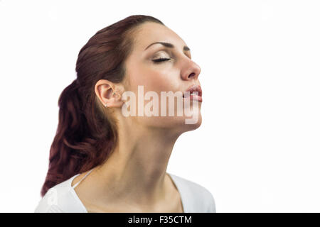 Bella donna con gli occhi chiusi Foto Stock