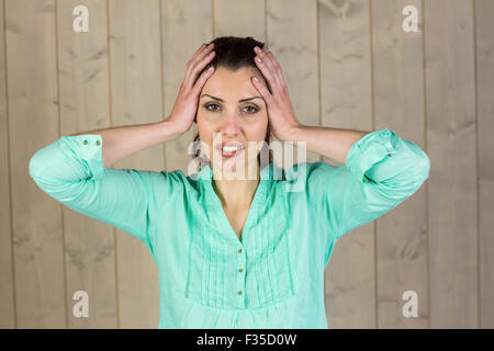 Ritratto di donna che soffre di mal di testa Foto Stock