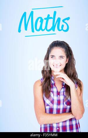 Matematica contro il bollino blu sullo sfondo Foto Stock