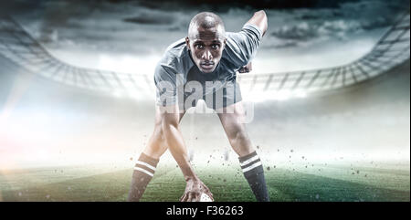 Immagine composita del ritratto di uno sportivo giocando a rugby Foto Stock