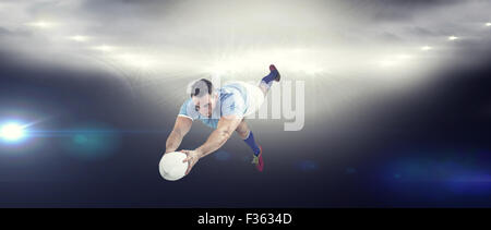 Immagine composita del giocatore di rugby con un punteggio provare Foto Stock