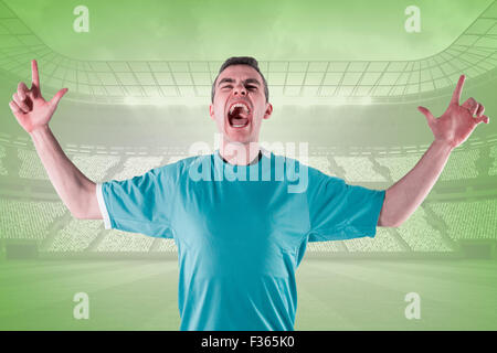 Immagine composita del giocatore di rugby gesticolando dita incrociate Foto Stock