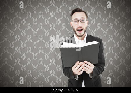 Immagine composita di giovani predicatore Lettura dalla Bibbia Foto Stock