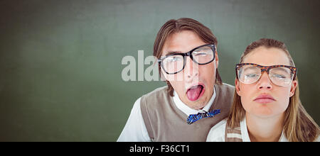 Immagine composita di divertenti geeky smorfie hipsters Foto Stock