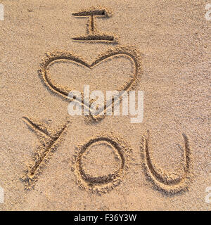 Nella foto una scritta sulla sabbia "ti amo". Foto Stock