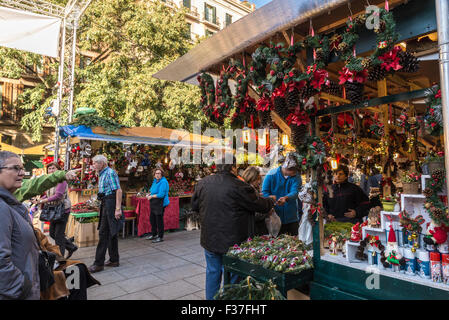 Santa llucia fair è un mercato di Natale. la figura più importante è la nascita del Bambino Gesù, caganer e caga tio Foto Stock