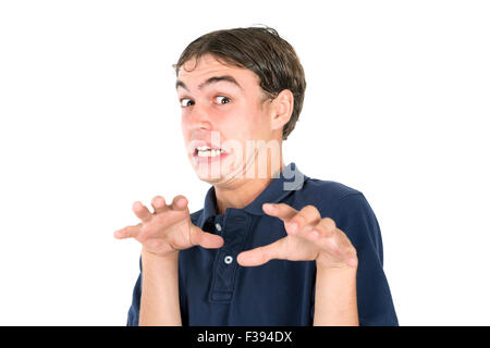 Adolescente nerd ragazzo che si affaccia isolata in bianco Foto Stock