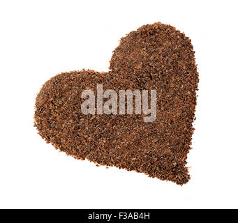 Gocce di cioccolato placer a forma di cuore isolato su sfondo bianco Foto Stock